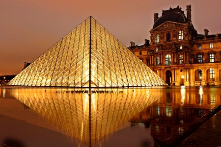 Pyramid of Louvre at night in Paris, France photo