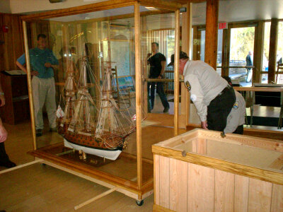 Service employees setting-up the Spanish Galleon exhibit
