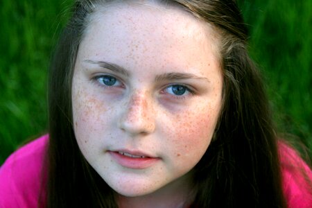 Freckle face portrait grass photo