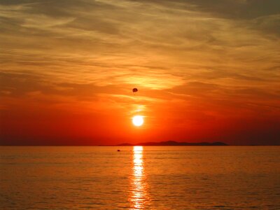 Sea water sunset photo