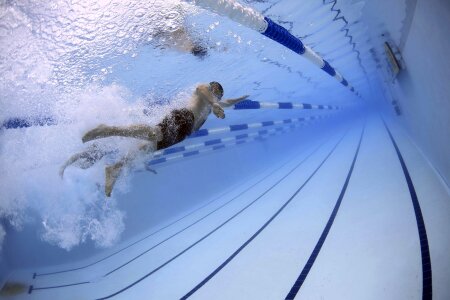 professional swimmer crawl underwater photo