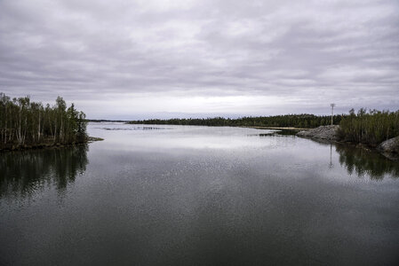 Cloudy landscape of water and the lake on the Ingraham Trail photo