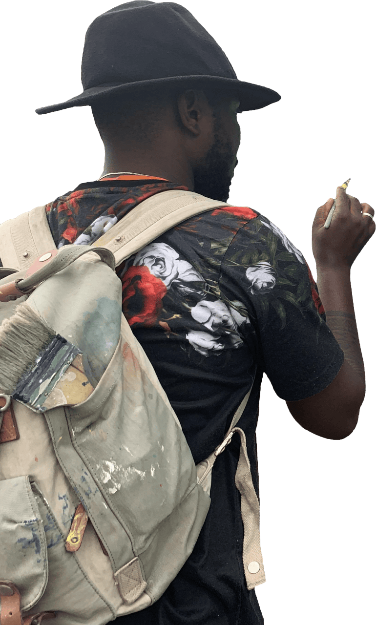Back view of man painting with brush