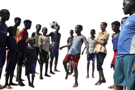 Young boys playing with ball