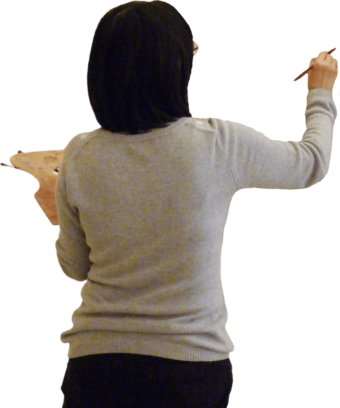 Back view of girl painting with brush and art palette