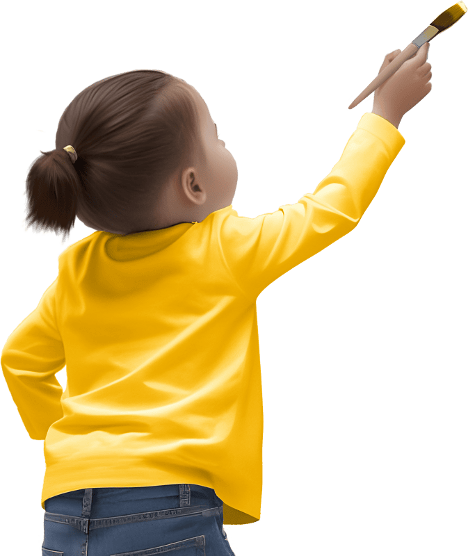 Back view of little girl doing painting on the wall