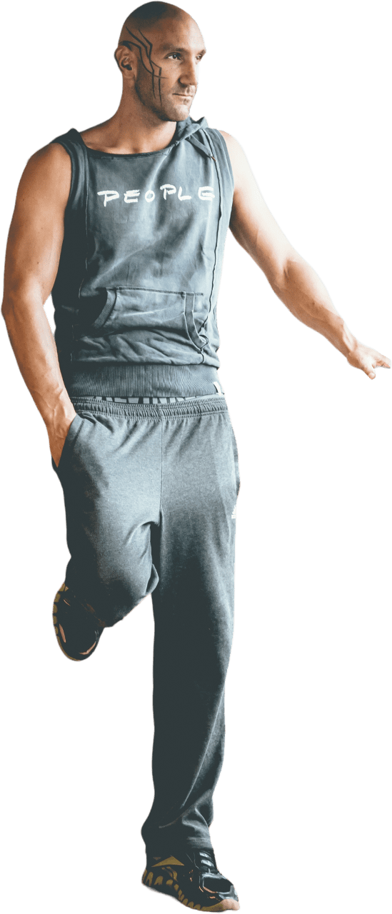Man in Workout Outfit Leaning on Wall