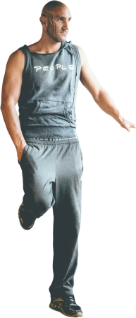 Man in Workout Outfit Leaning on Wall
