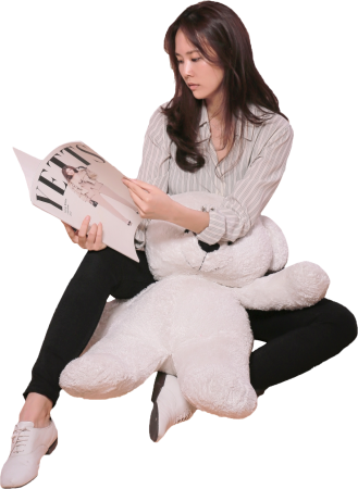Asian Woman Reading Magazine
