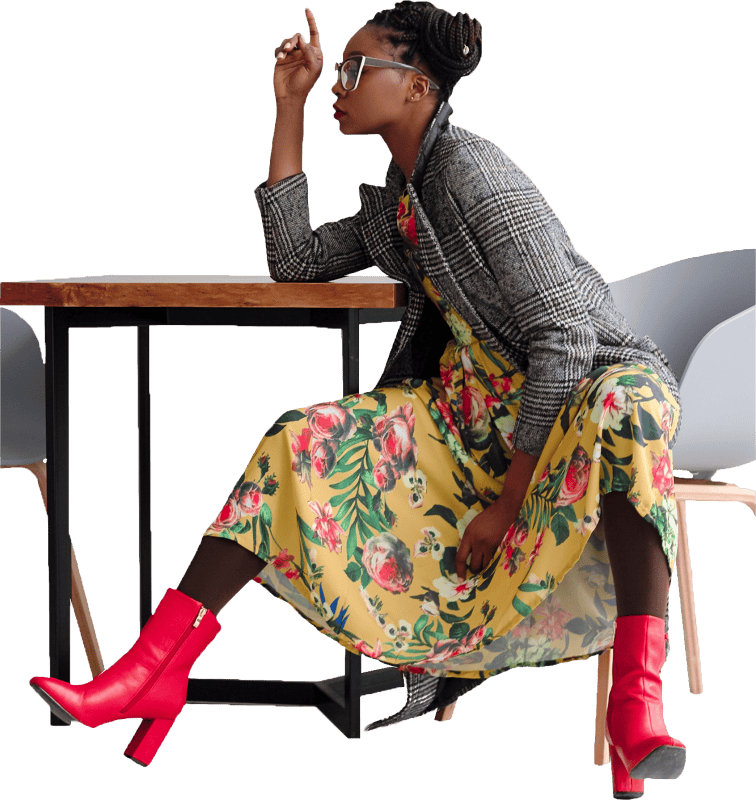Black Woman Sitting Elegantly