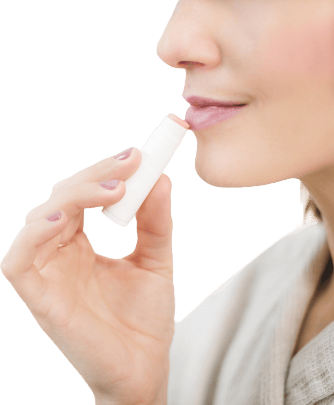 Woman Applying Lipstick