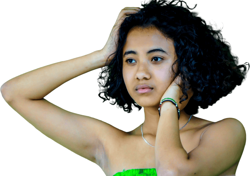 The girl is looking into the distance