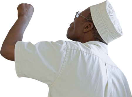 Man Raising Hand in Traditional Hat