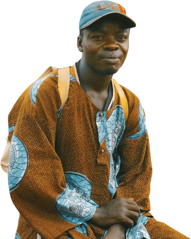 Man Sitting in Traditional African Outfit