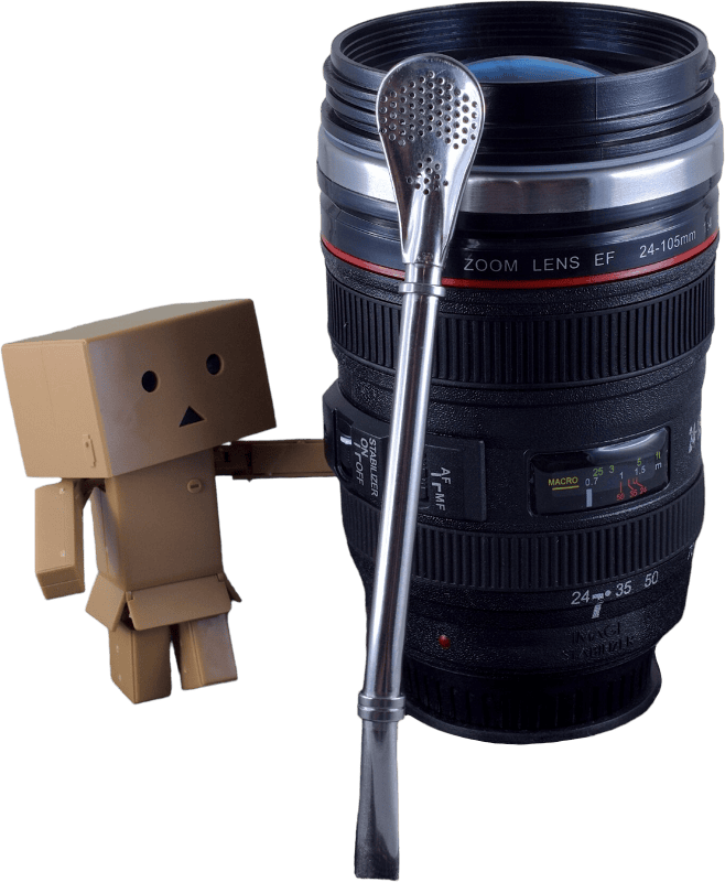 Camera lens mug with cardboard robot