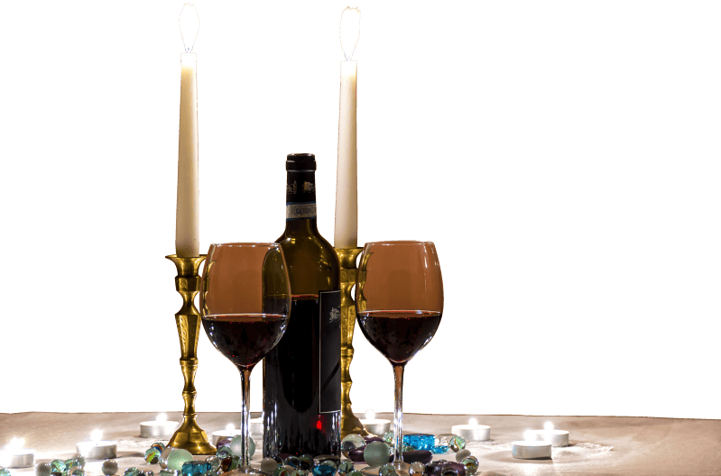 Wines glasses with romantic candles