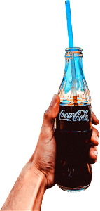 Person holding coca cola glass bottle