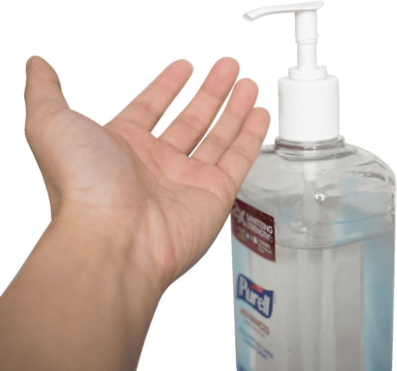 Left hand under sanitizer bottle nozzle