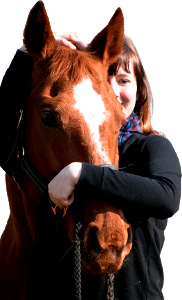 Woman hugging horse