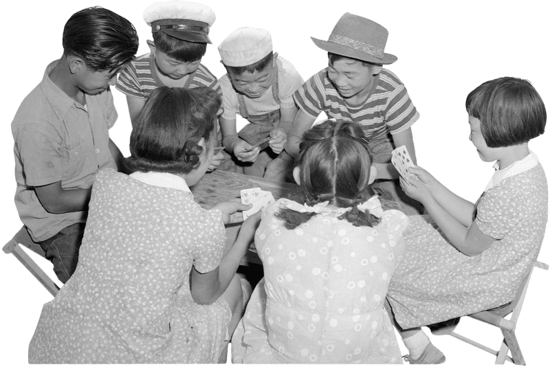 Poston arizona group of evacuee children enjoying game of black jack at this war