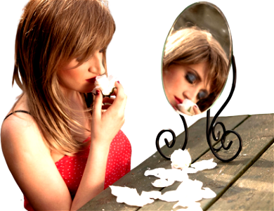 Woman smell rose mirror