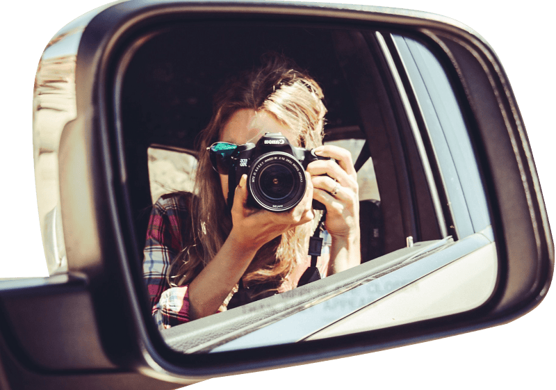 Photographer in car