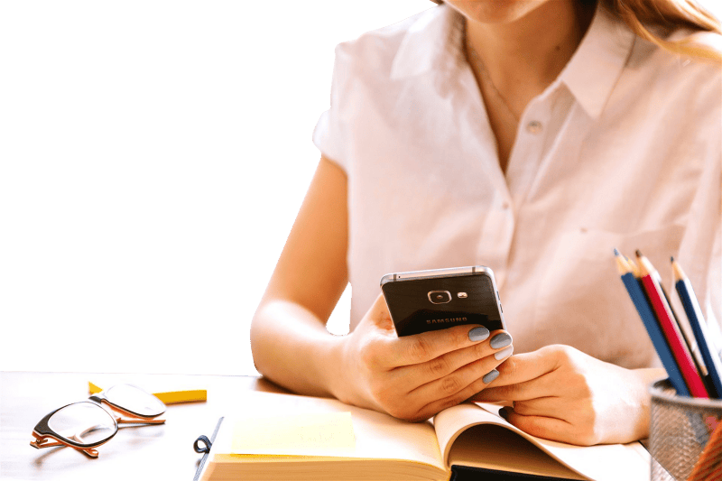Businesswoman smartphone office