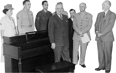Photograph Of President Truman At The White House Receiving A Piano From The Pia Original
