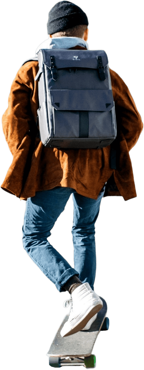 Man Wearing Brown Jacket Blue Denim Jeans and White Shoes Riding Skateboard on S Xl