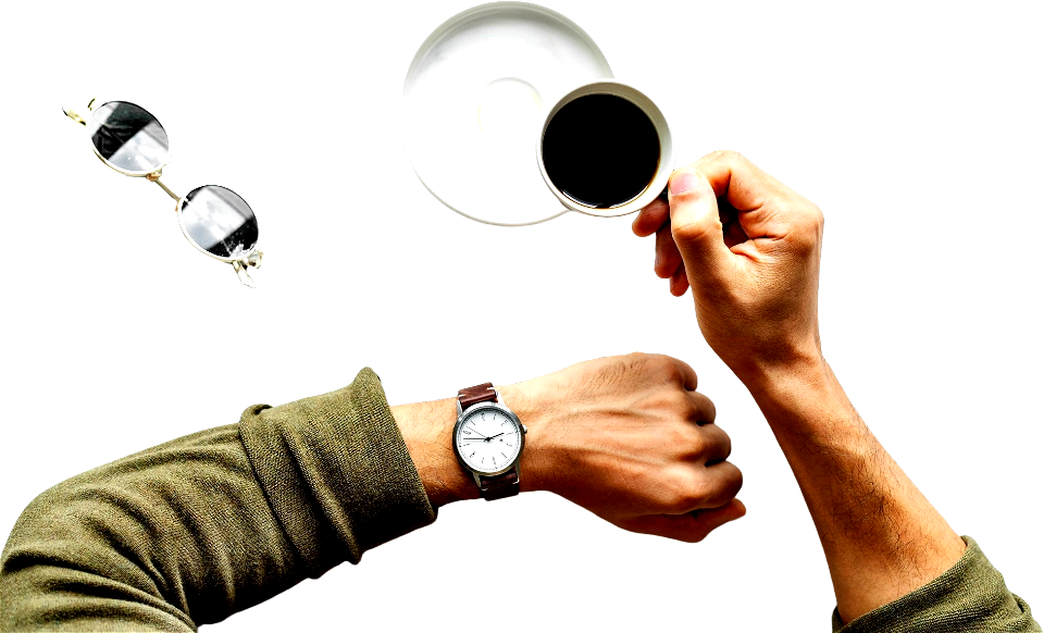Hands with cup af coffee and watch
