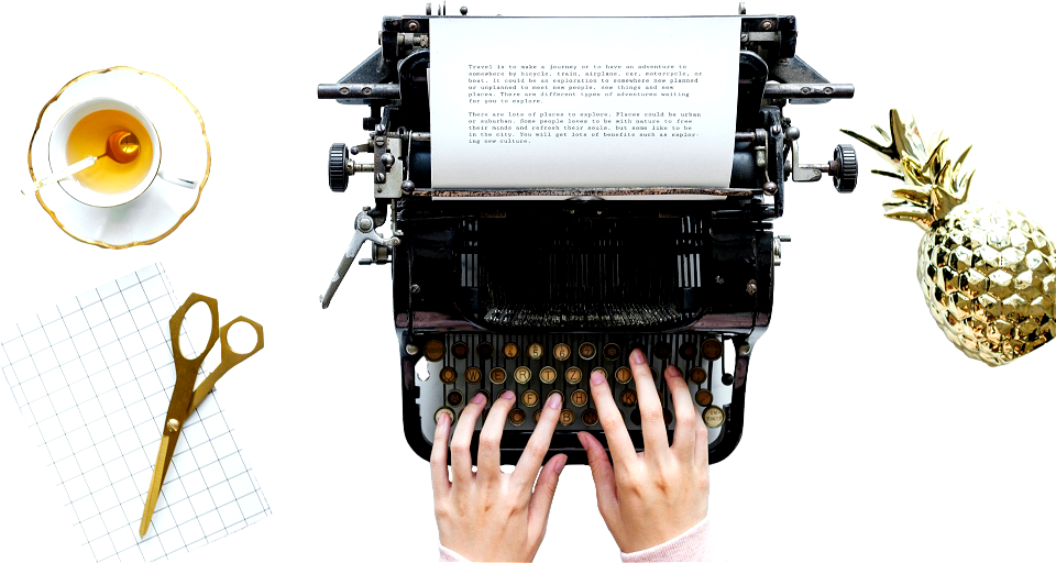 Hands typing on a antique typewriter