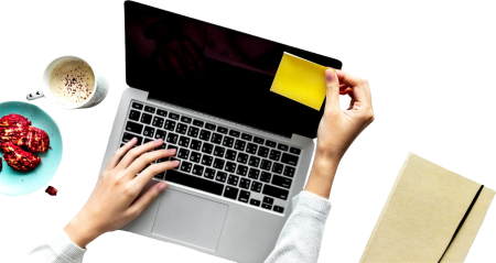 Hands on a laptop keyboard