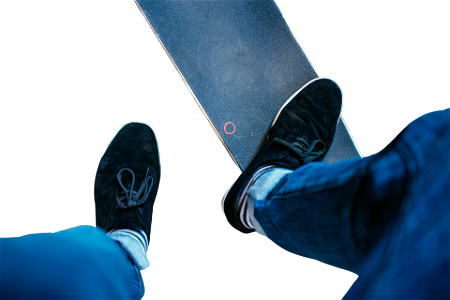 Feet on skateboard