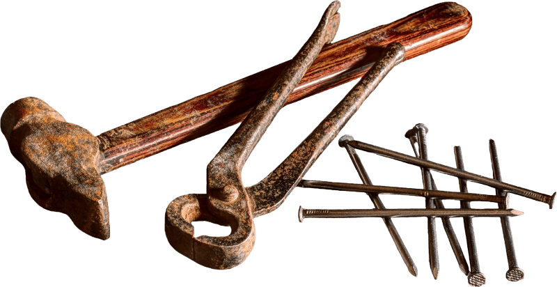 Brown hammer near silver nail