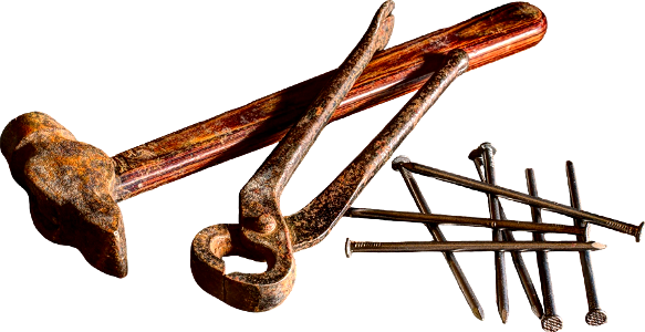 Brown hammer near silver nail