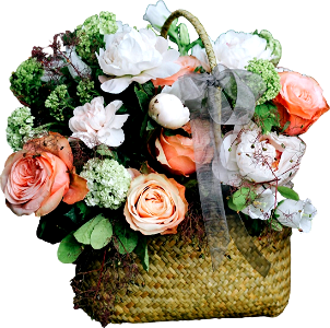 Bouquet of white and pink flowers in basket