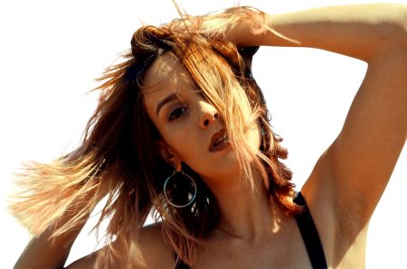 Close up photography of a woman touching her hair