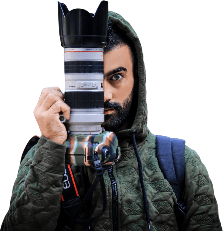 Person holding a dslr camera photo md