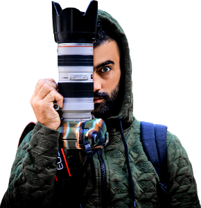 Person holding a dslr camera photo md