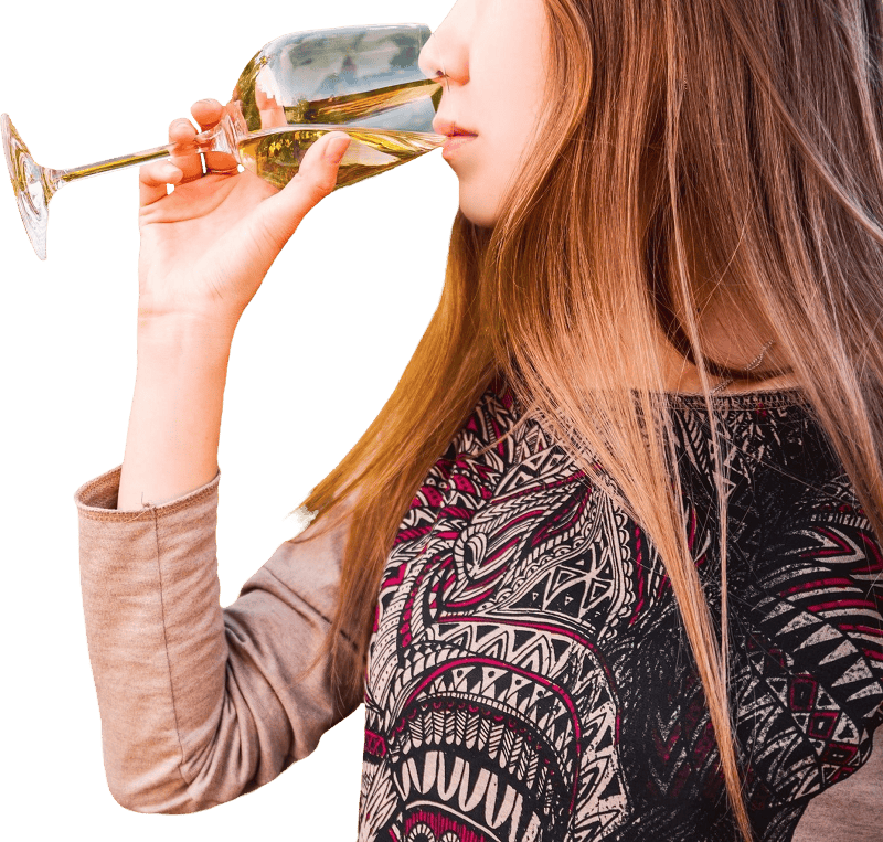 Gorgeous brunette woman having wine fun in the vineyards
