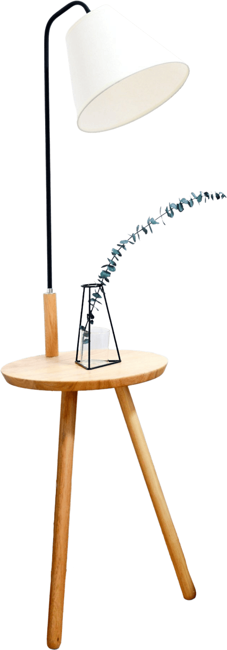 White shade table lamp near bed