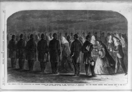 Mrs. Surratt with the conspirators and assassins, hooded and ironed proceeding to the penitentiary at Washington, from the steamer Keyport which brought them to the wharf from the gunboat in LCCN99613998, Frank Leslie, 1865