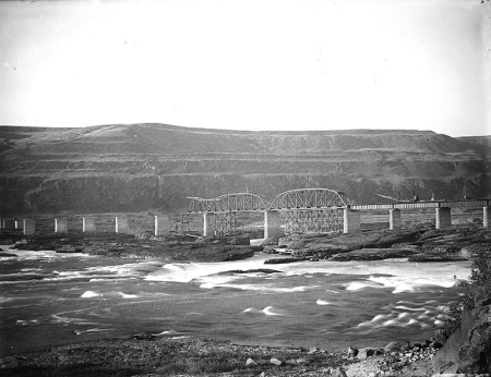 Oregon Trunk Railway bridge on the Columbia River at Celilo Falls, ca. 1913, circa 1913