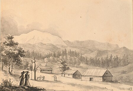 Mountain landscape. In the foreground three low houses and a high plinth with a statue at whose foot a donkey is grazing. Furthermore, in the far foreground two people are seen conversing, one with a cane in his hand, Johan Christian Dahl, circa 1822