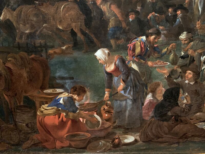 Market scene in Prati outside Rome with the dome of Saint Peter's in the background, on the left side of the foreground carnival-goers, Jan Miel, circa 1650