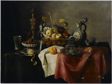 Still life with gilt beaker in a bowl of walnuts and a basket of fruit with other objects on a table, Cornelis Mahu, circa 1650
