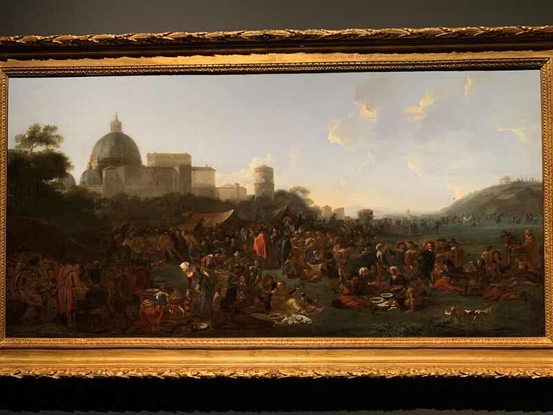 Market scene in Prati outside Rome with the dome of Saint Peter's in the background, on the left side of the foreground carnival-goers, Jan Miel, circa 1650