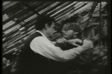 Hudson threatening Nicol in The Screaming Skull (00.55.13), John Hudson