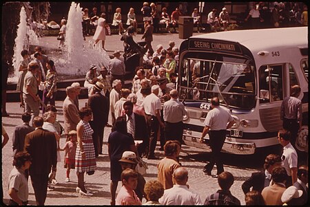 CINCINNATI BOUGHT THE PRIVATELY-OWNED TRANSIT SYSTEM RENAMED IT "METRO" AND PUT NEW PAINT ON THE BUSES. THE NEW SYSTEM IS INTRODUCED AT NOONTIME IN DOWNTOWN FOUNTAIN SQUARE