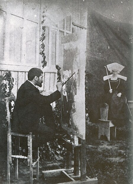 Photograph of Pascal Dagnan-Bouveret painting The Pardon in Brittany while a model by the name of Walter poses., Pascal Dagnan-Bouveret, 1886